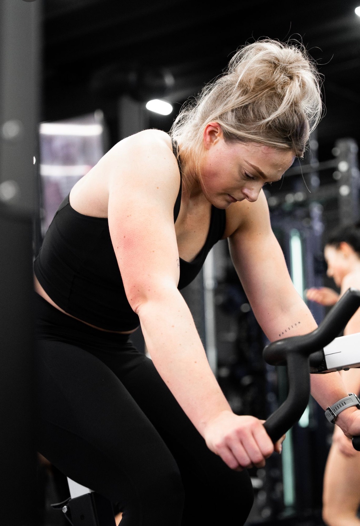 Member training on the bike at Physical Formula